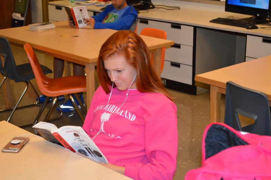 Annabel Granger (9) intently reads a book in Mr. Josselyns BKT.