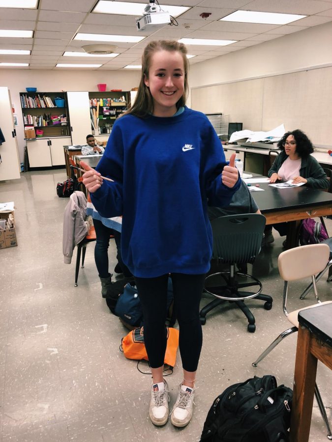 Elodie Price shows off her blue themed fit for spirit week.