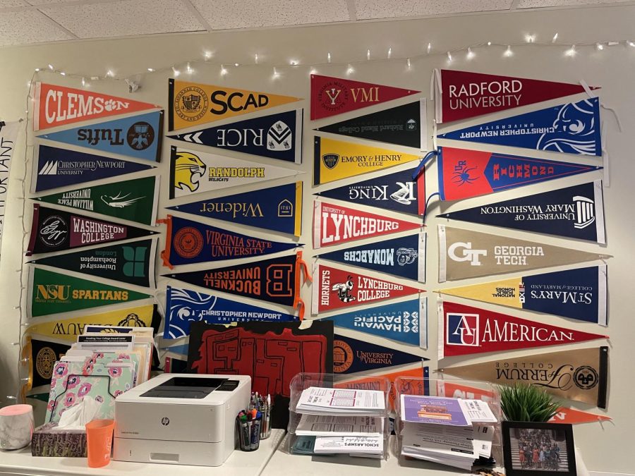 A+wall+of+university+and+college+pennants+located+in+Ms.+Obermeyers+office+at+C.H.S.