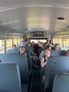 Field Hockey players on the way to an away game. By Lulu Jennings