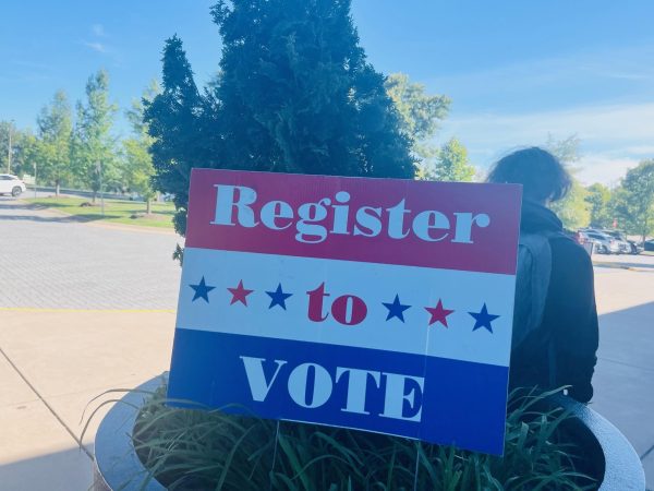 A voting registration sign outside the YMCA.