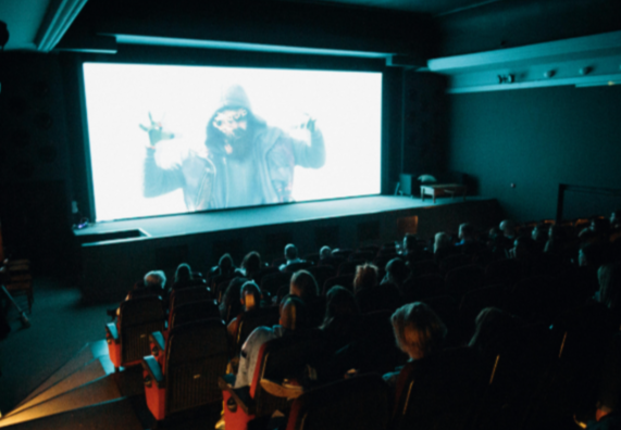 People watching a movie in a movie theater