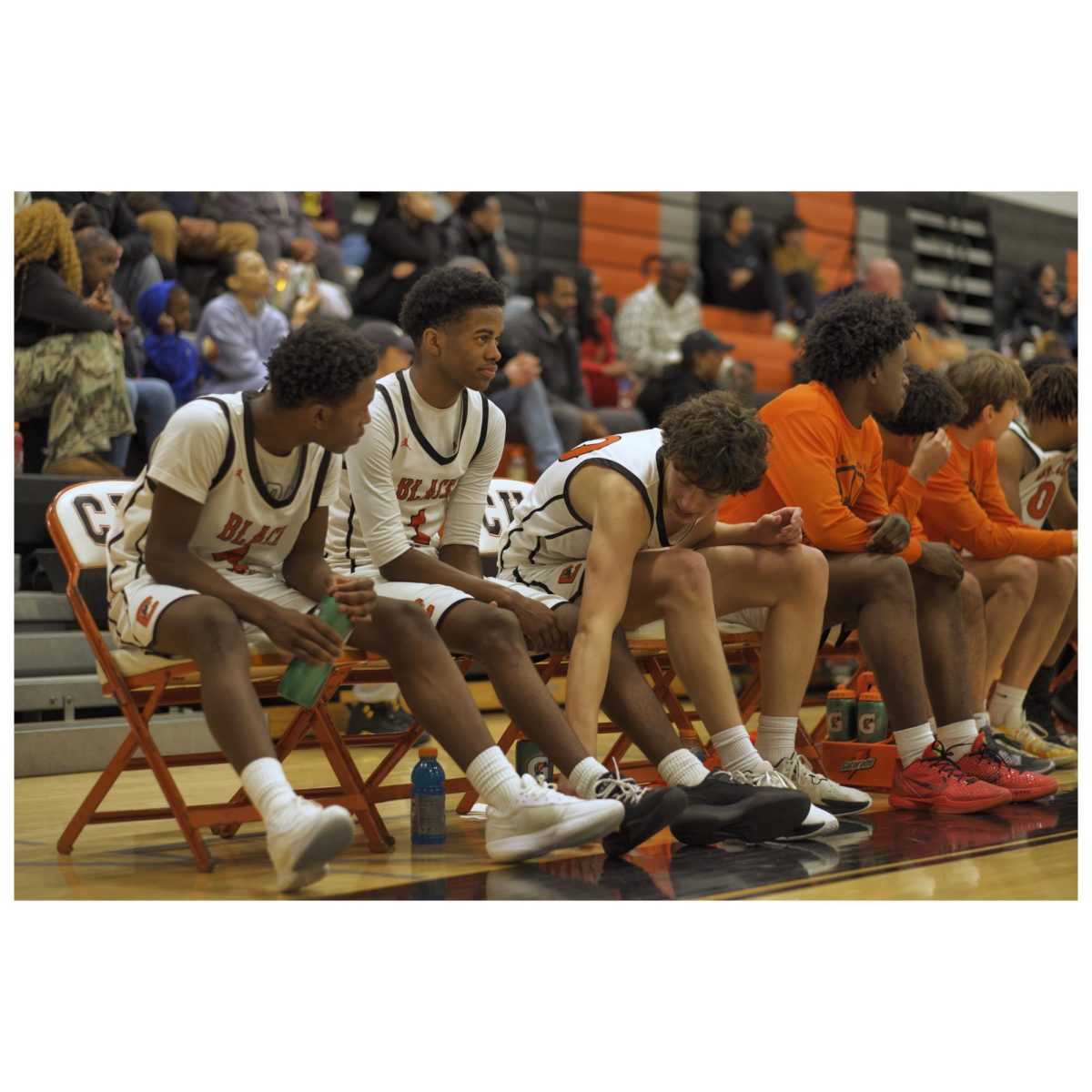 The Black Knights bench watching the game.