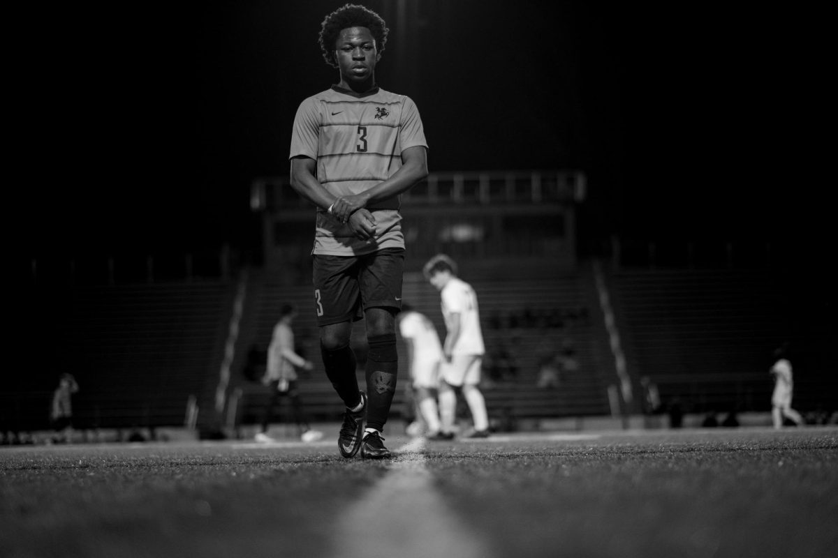 Gilbert Kashindi walking to his spot before kickoff.