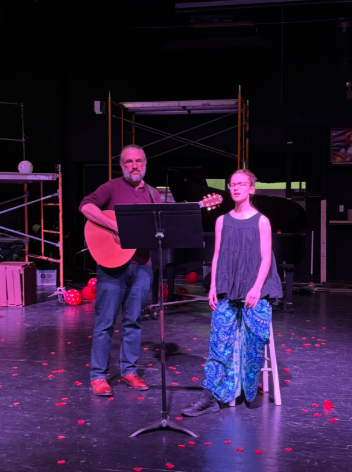 Olivia Colvin and her father performing at a Cabaret