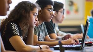 Students taking a computerized test. Courtesy of Stock Cave